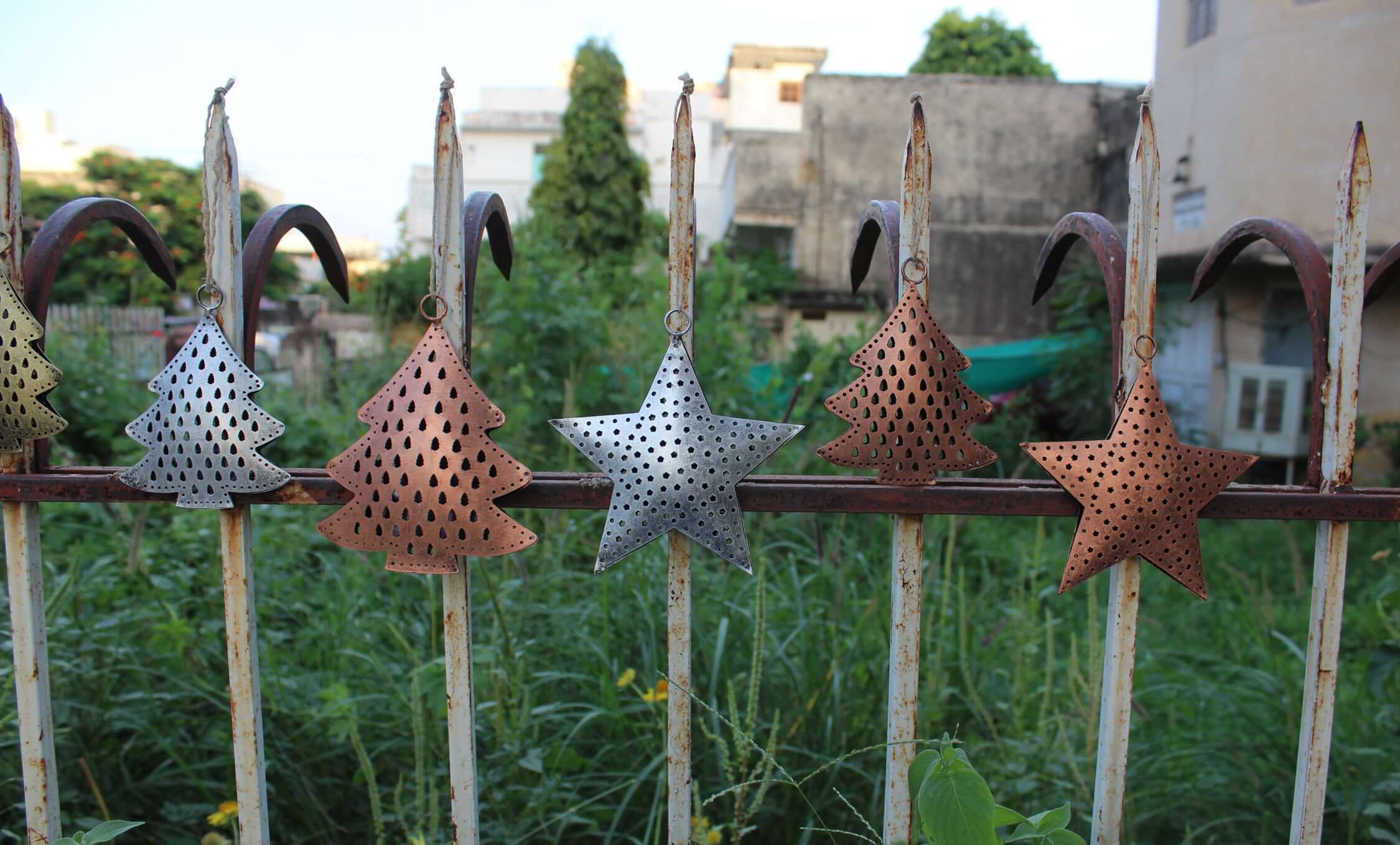 Festive recycled iron ornaments with unique designs. Durable, lightweight, and perfect for your Christmas tree decor!